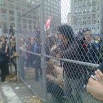 Protesters going through he fence: Via Lindsey Christ